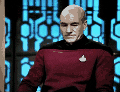 Le capitaine Picard se prenant le visage dans la main