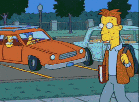 Homer Simpson en étudiant chargé de livres